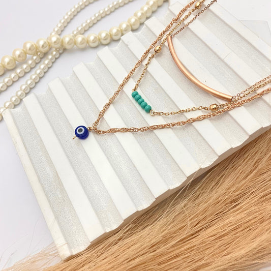 Golden Triple Layered Evil Eye Charm Necklace For Girls Perfect For Dailywear - DropShp