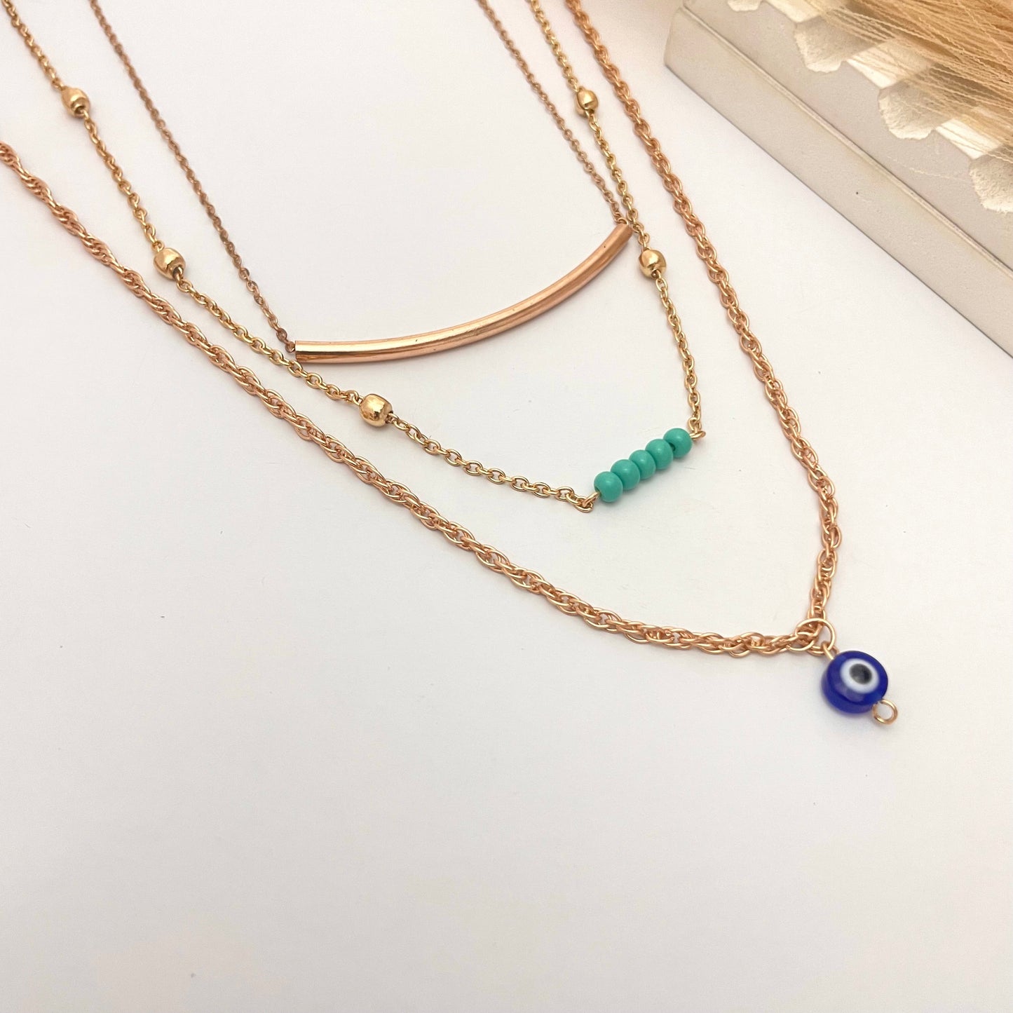 Golden Triple Layered Evil Eye Charm Necklace For Girls Perfect For Dailywear - DropShp