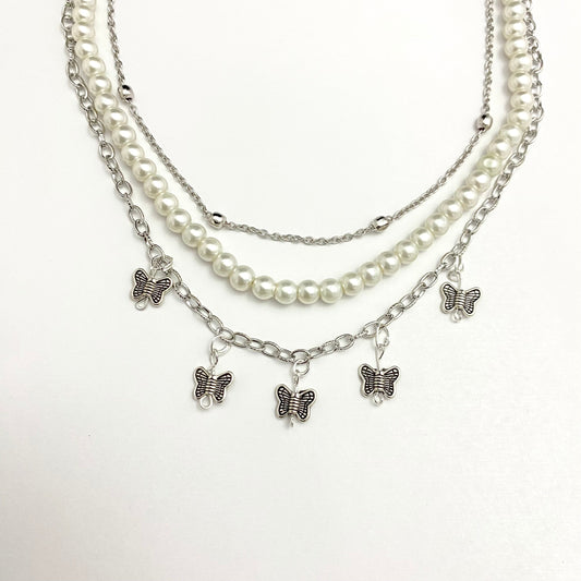 Triple Layered Pearl Chain Necklace With Hanging Butterfly Charms - DropShp