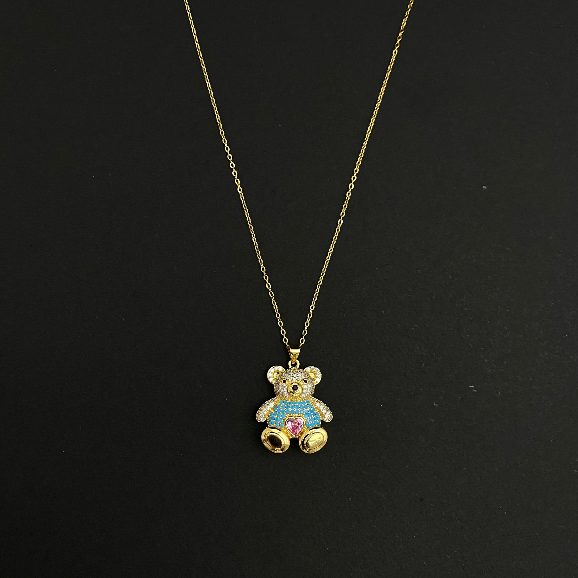 Golden Copper Stone Studded Blue Bear Pendant Necklace With Stainless Steel Chain - DropShp