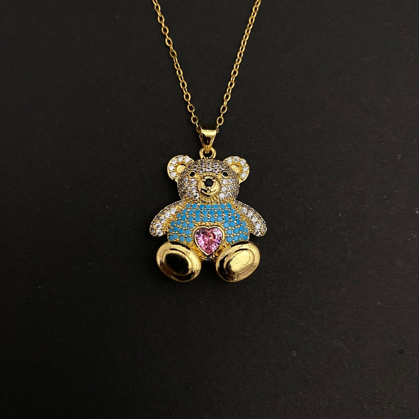 Golden Copper Stone Studded Blue Bear Pendant Necklace With Stainless Steel Chain - DropShp